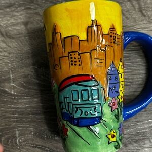 San Francisco mug with a unique design, featuring a blue handle